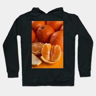 Oranges on a yellow background Hoodie